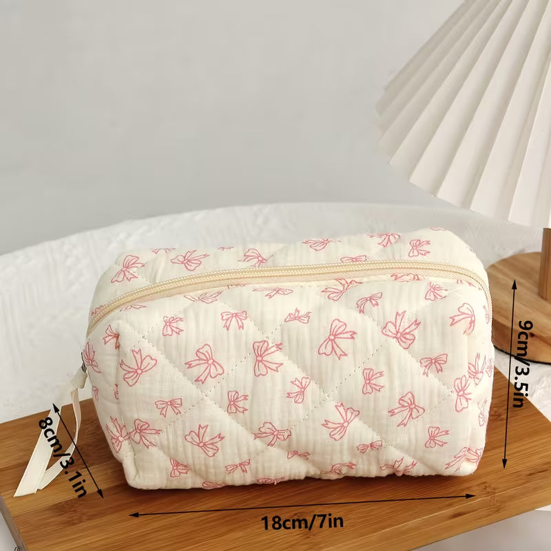 Quilted Bow Print Cosmetic Pouch | Cream & Pink