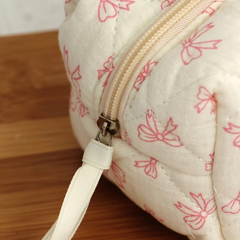 Quilted Bow Print Cosmetic Pouch | Cream & Pink